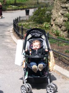 Shorty #1 in NYC with her Grandma - note the bags piled on the back of the stroller!